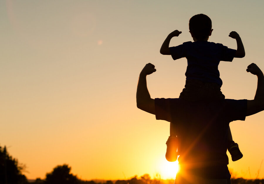 Father,And,Son,Playing,In,The,Park,At,The,Sunset